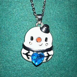 cute snowman holding blue cz stone necklace